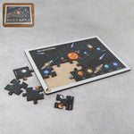Top view of wooden puzzle board layout with colorful peg pieces