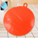 Red silicone dish scrubber for gentle non-stick cleaning