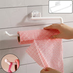 Wall mounted paper towel holder with strong suction cup holding kitchen tissue roll