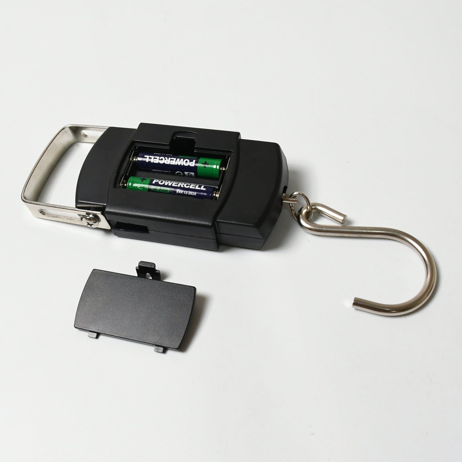 Hand holding the hook-type digital weighing scale, suitable for luggage.
