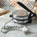 Alternative angle showing compact design of electric roti maker