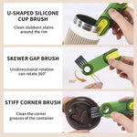 The compact brush head easily scrubbing the intricate grooves of a cup lid.