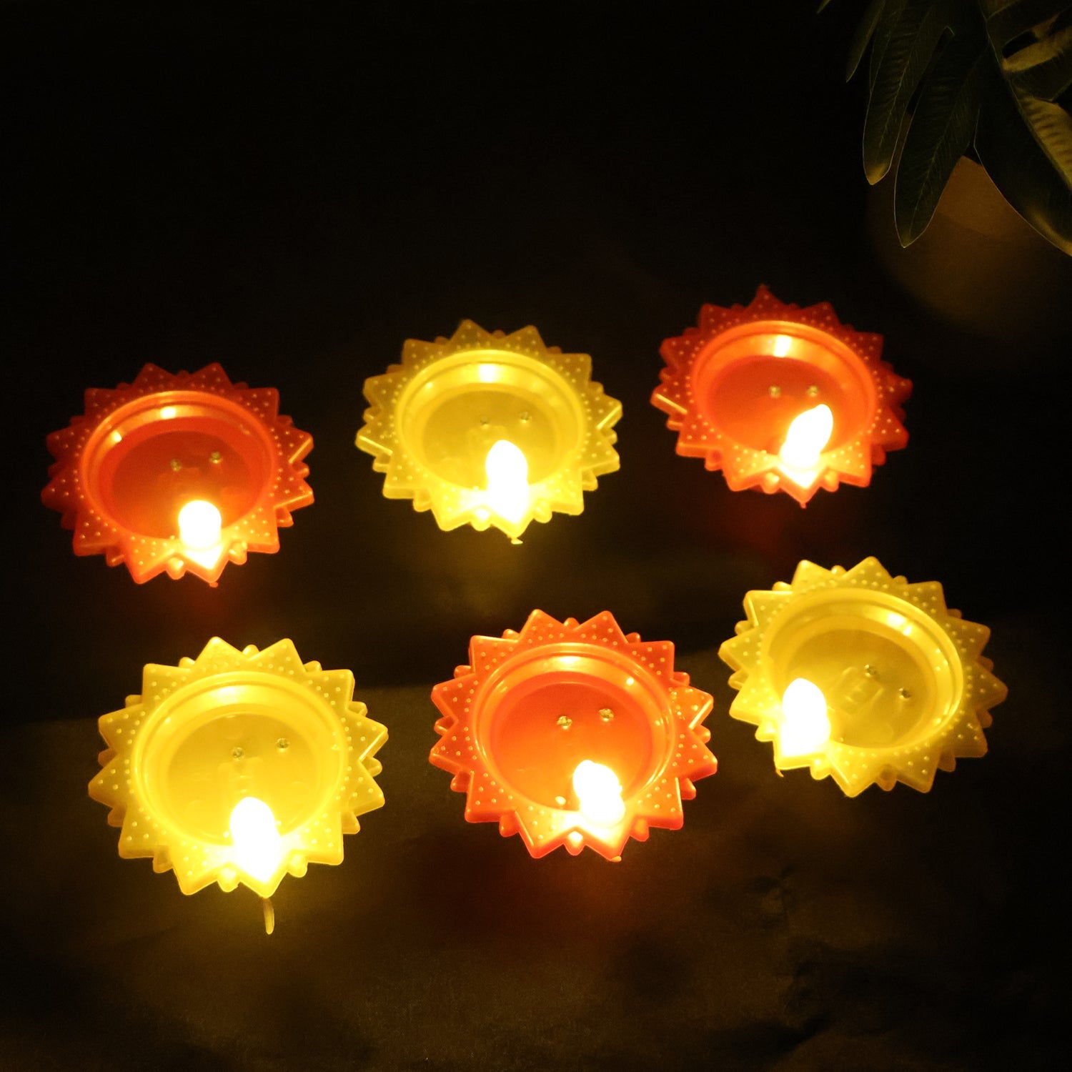 Festive water sensor LED diya set creating warm decorative lighting