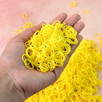 Close-up view of premium elastic rubber bands showing strong stretch