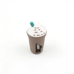 A coffee sharpener with a pencil, highlighting its fun design for students.
