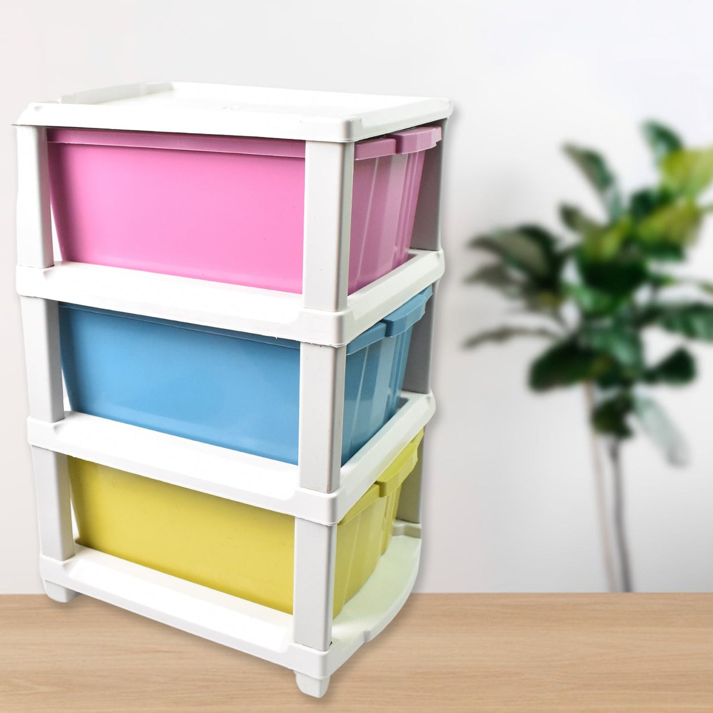 Compact 3-tier plastic drawer unit effectively used for bathroom essentials.