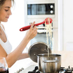 Ergonomic nonslip silicone server spoon for spaghetti.