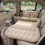 Inflatable car mattress installed in sedan back seat for travel