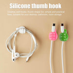 WipeTech cord holder clips securing cables on a desk and in a car.