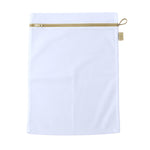 Compact mesh bag ideal for organising clothes during travel.