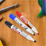 Blue, black and red whiteboard markers with a handy board duster