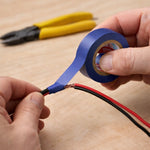 Compact electrical insulation tape roll in toolbox