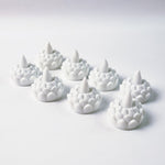 Lotus shaped LED flameless tealight candles used for festive puja decor