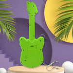 Toddler pressing keys on the butterfly shaped musical guitar toy.