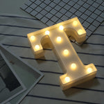 Decorative light with LED bulbs in marquee letter T design