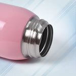 Side view of thermos kids water bottle highlighting compact 600ml size