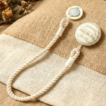 Decorative magnetic curtain accessory with twisted rope design