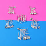 Single metal safety pin with smooth finish for fabric fastening