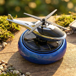 Solar powered rotating helicopter air freshener for car interior