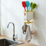 Rotatable sticky wall hook hanging multiple household items securely