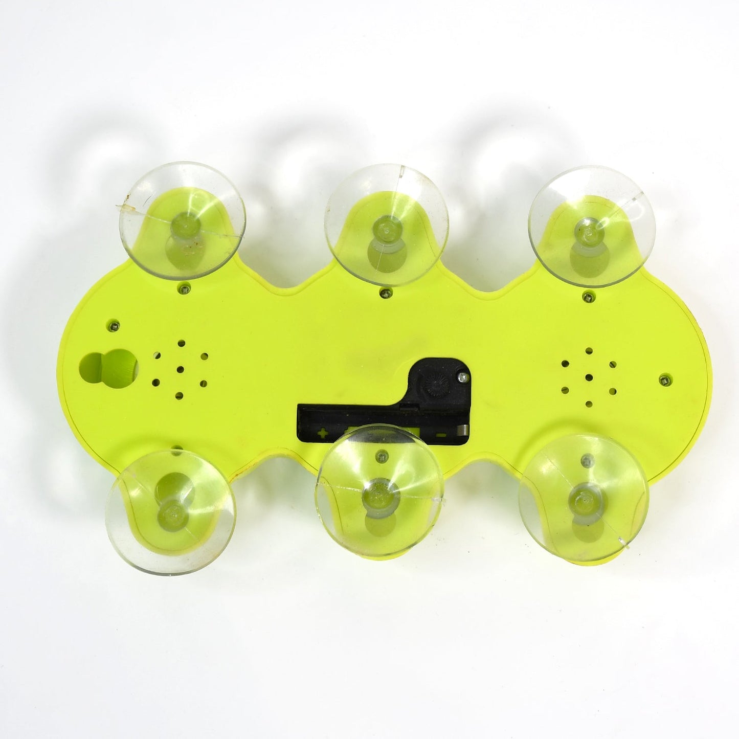Rear view of the Indo Glow desktop clock showing control buttons and battery compartment.