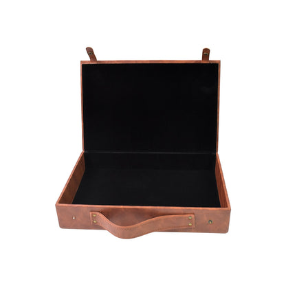 Detail shot of the sturdy handle and stitching on the ClassiCarry leather case.