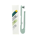 Sleek white round hook towel holder, perfect for modern bathrooms.