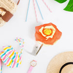 A collection of unique design self adhesive wall hooks displayed together.