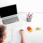 The 5-piece food-shaped eraser set displayed in its clear packaging, ready for gifting.