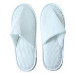 Spa slippers for guests combining comfort and single-use hygiene