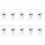 Kitchen utensil hanging on adhesive wall hook