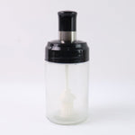 Crystal clear oil dispenser bottle featuring silicone basting brush applicator