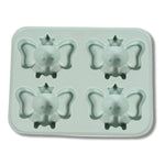 Ice cubes in fun cartoon shapes being easily released from the silicone tray.