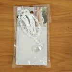 Fancy crystal curtain strap with teardrop pendant detail