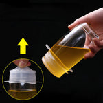 Small silicone lids sealing a jar and a mug.