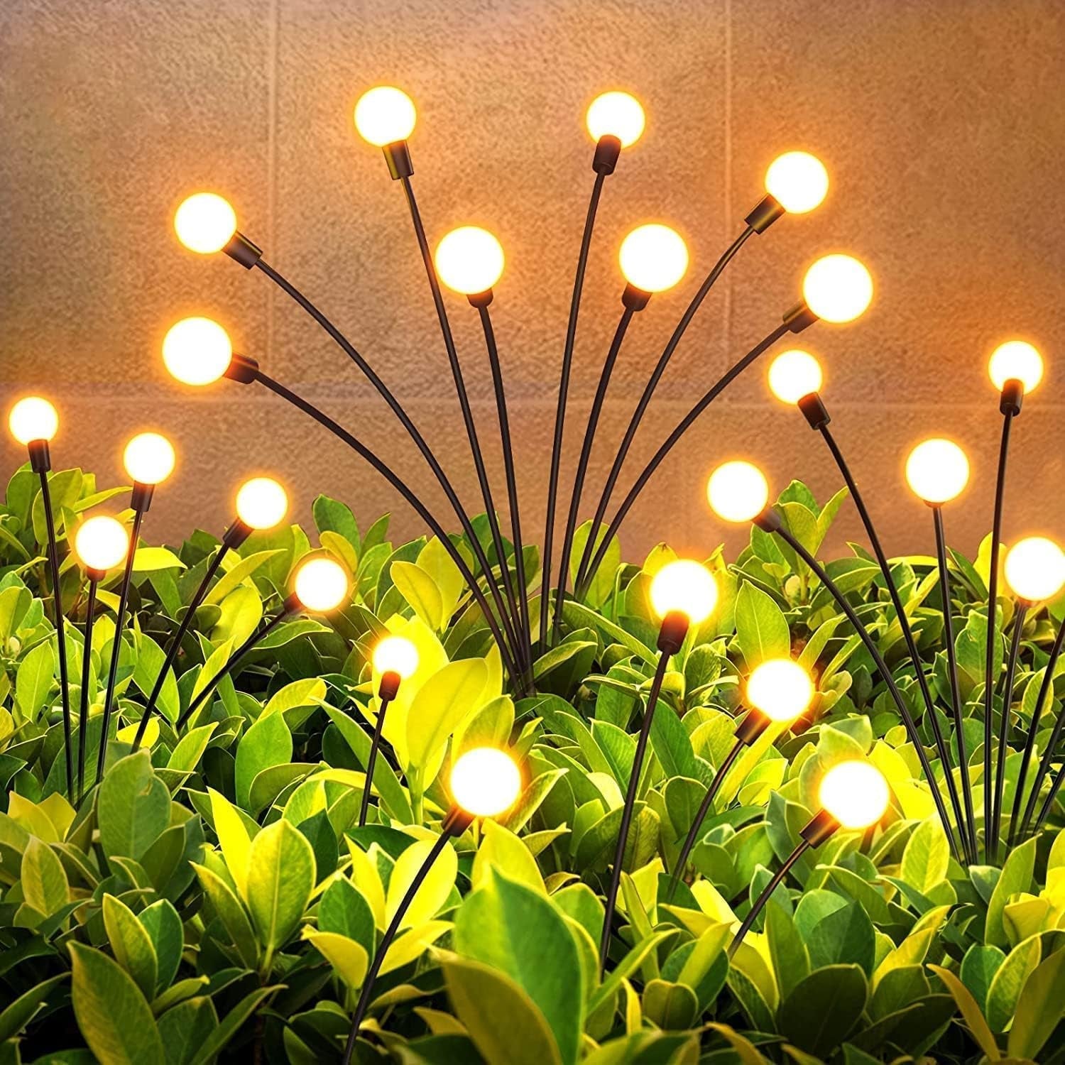 Solar garden ball lights creating a warm glow in outdoor setting