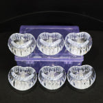 Battery powered LED crystal tealight candles set illuminating room