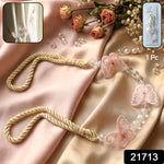 Decorative floral bead curtain holder with twisted rope design