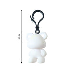 Bear keychain accessory clipped onto school bag handle
