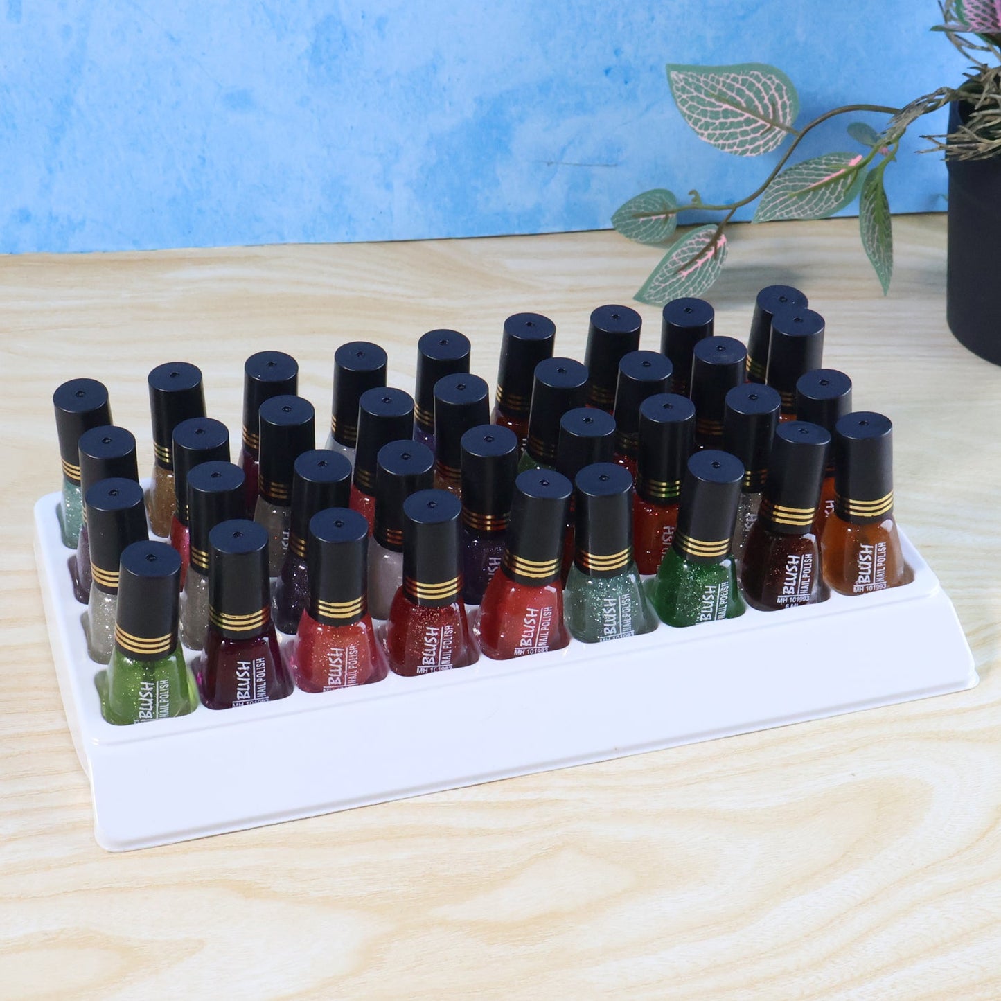 Nail polish container with a bright, shiny glitter finish