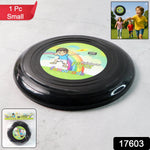 Compact small outdoor frisbee disc thrown in open park space