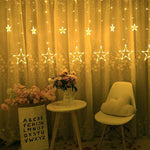 Star-shaped curtain string lights illuminated with multiple flashing modes for ambiance.