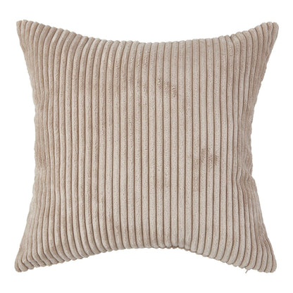 Decorative corduroy cushion cover adding elegance to a contemporary living room setting.