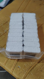 Detailed view of a bamboo cotton swab's pure cotton tip.