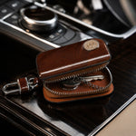 Brown leather car key case holder with zipper and clip