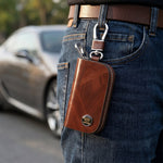 Car key snap hook being used to clip key holder