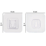 A robust heavy-duty adhesive hook in use, holding multiple items securely.