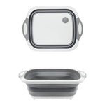 Compact foldable chopping board with dish rack and washing bowl features.
