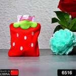 Cute strawberry hot water bag on a white background, ready for use.