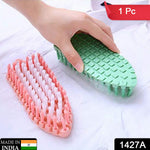 Velvet Wipe flexible cleaning brush in hand, ready for use.
